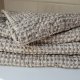 Half-linen bath towel with grey and white squares